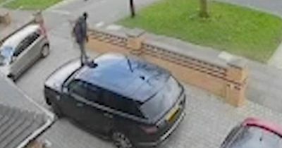 Moment biker screams 'you nearly killed me' at driver and jumps on car bonnet