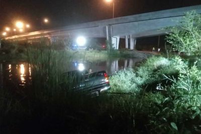 GPS guides pickup driver into canal, 5 swim to safety