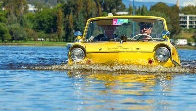 Is it a car or a boat? It's an 'Amphicar' and two are on the lake