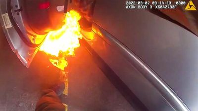 VIDEO: Brave Cop Drags Unconscious Driver From Burning Vehicle After Crash