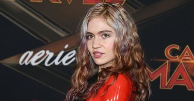 Grimes moves on from Elon Musk and ‘is dating whistleblower Chelsea Manning’