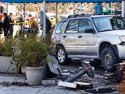 Two dead and nine injured as SUV crashes into restaurant’s outdoor seating area in Washington, DC