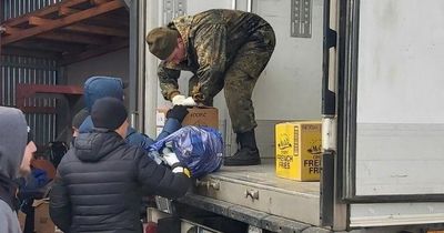 Edinburgh and Lothians donations seen getting unloaded across Ukrainian border