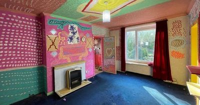 Flamboyant three-bed Glasgow flat bursting with colourful wacky paint work hits market