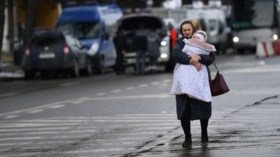 Photos show the grim reality of Ukraine's women, children searching for safety under Russia's invasion