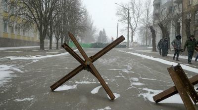 In Ukraine Ghost City, Florist Stays Open to 'Cheer People Up'