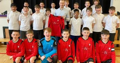 School football team kitted out thanks to Lanarkshire dental clinic