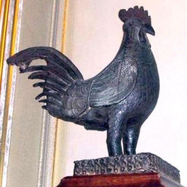Benin bronze row: Cambridge college removes cockerel