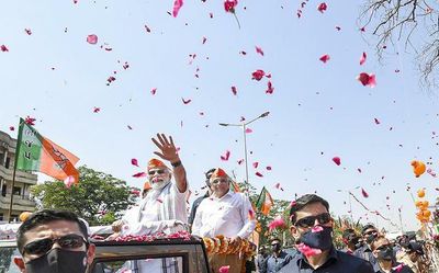 On action-packed visit, PM leads three road shows in Gujarat