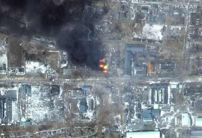 Satellite images show fires, severe damage to residential buildings in Mariupol