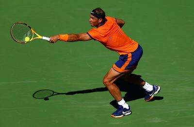 Nadal ekes out Indian Wells win as No. 1 Medvedev cruises