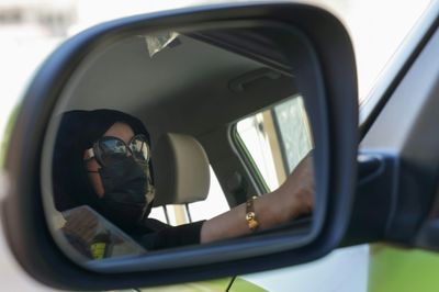 Saudi women drive for extra cash as costs climb