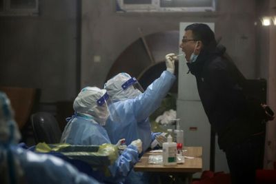 China records nearly 3,400 daily virus cases in worst outbreak in 2 years