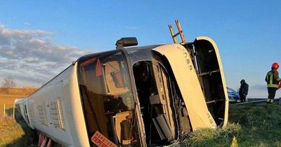 Bus carrying Ukrainians overturns in Italy killing one and leaving dozens injured
