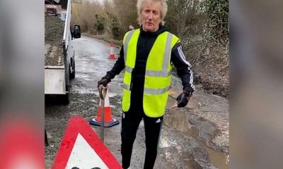 ‘My Ferrari can’t go through’: Rod Stewart fills potholes outside his Essex estate