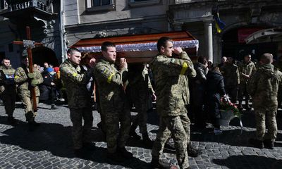 Ukraine mourns its fallen as Zelenskiy says 1,300 soldiers killed