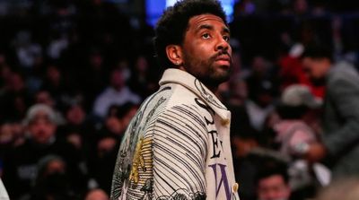 Watch: Kyrie Irving Watches Courtside As Nets Beat Knicks in Barclays Center