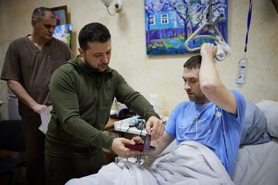 Zelensky visits wounded soldiers in hospital to hand out medals and make them ‘Heroes of Ukraine’