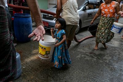 Yangon residents queue for water as power blackouts bite