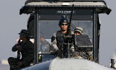 Philippines summons Chinese ambassador over navy ship's 'intrusion'