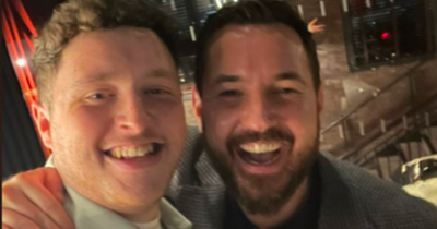 Comedian Paul Black poses with 'shy fan' Martin Compston in series of snaps