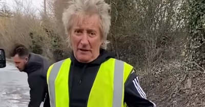 Rock legend Rod Stewart takes matters into his own hands after ambulance bursts tyre on pothole filled road