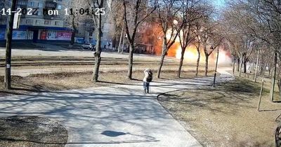 Terrifying moment Russian missile explodes into fireball in middle of street in Kyiv