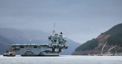 UK's largest warship HMS Queen Elizabeth pictured arriving in Scotland