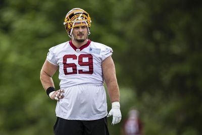 Washington re-signs veteran center Tyler Larsen