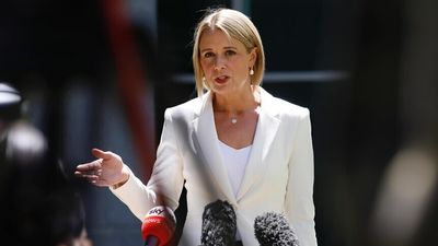 Two people charged for making online threats against Senator Kristina Keneally