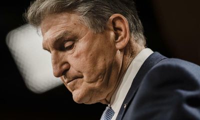 Manchin ‘very reluctant’ on electric cars in ominous sign for Biden’s climate fight