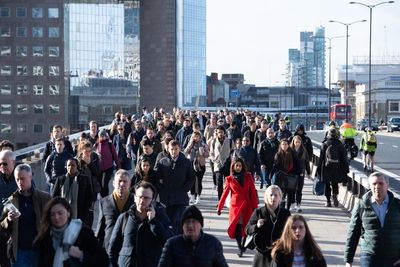 Unemployment falls below pre-pandemic levels but pay growth hit by inflation