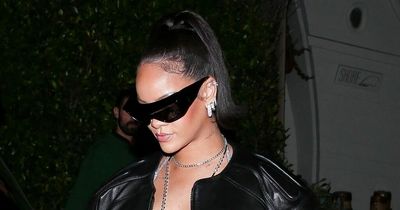 Pregnant Rihanna stuns as she shows off her baby bump in an all-leather outfit
