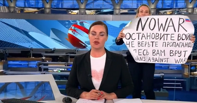 Russian journalist arrested after anti-war protest live on air could face 15 years in jail