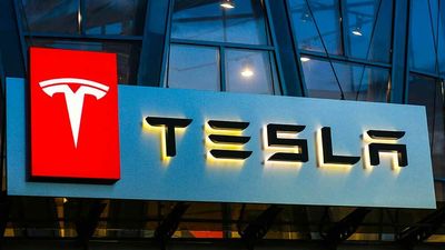 Dow Jones Rallies As Fed Meeting Kicks Off; Tesla Raises Car Prices