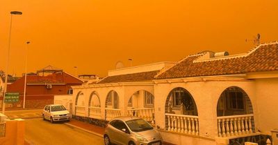 Sky turns orange as dust from Sahara desert falls across Spain - and UK could be next