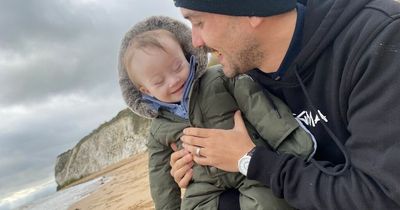 Dad fights back against trolls who say he should 'stop having kids' as two are disabled