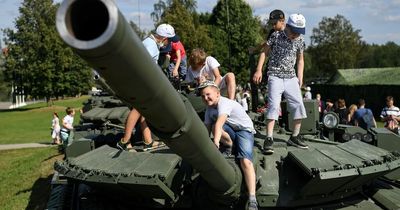 Inside Putin's 'military Disneyland' where kids climb over tanks and fire grenades