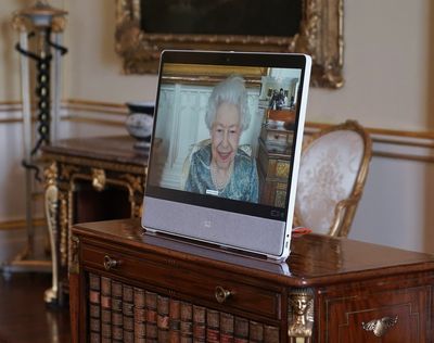 Queen greets diplomats on screen at Windsor