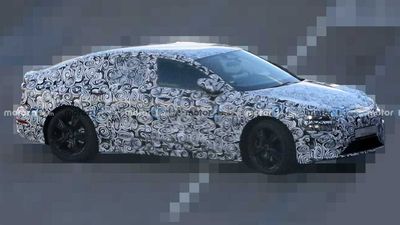 Audi A6 E-Tron First Spy Shots Show EV With Split-Headlight Design