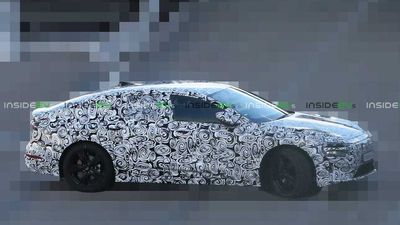 First Audi A6 E-Tron Spy Photos Show Sleek Fastback With Split Headlights