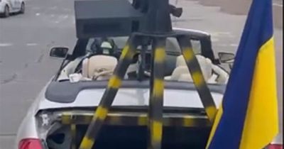Ukrainian cops gifted BMW 6 Series decked out with national flag and machine gun turret