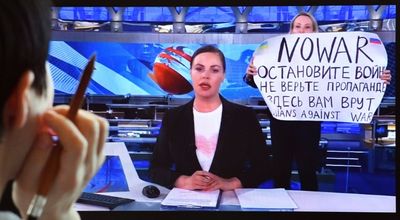 Russian court fines TV protester amid outcry