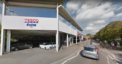 Baby almost hit as people throw brick from roof of Tesco car park