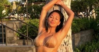Nicole Scherzinger shows off toned abs on romantic getaway with Thom Evans