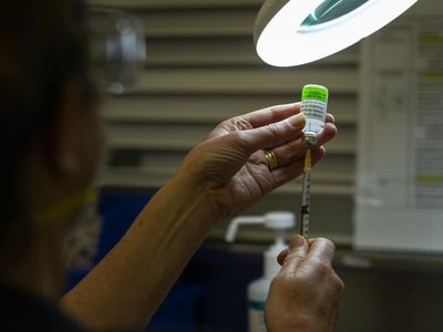 Vaccine challengers end case, pay costs