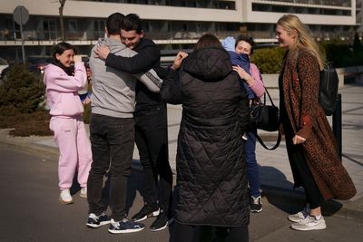 UK-based Russian-Ukrainian couple reunited with family at visa centre in Poland