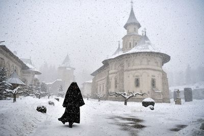 Romanian monks welcome Ukrainian refugees at medieval monastery