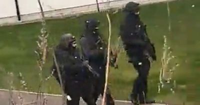 Edinburgh armed police swoop on residential flats in clip filmed by neighbour