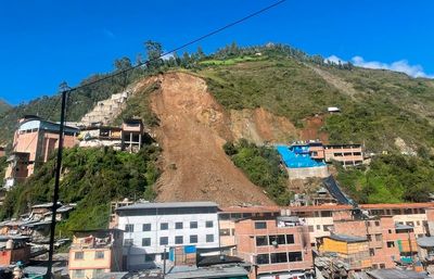 Peru landslide buries dozens of homes with search underway for missing